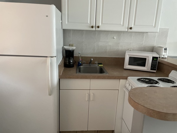 Efficiency, one queen bed- kitchen Photo 3