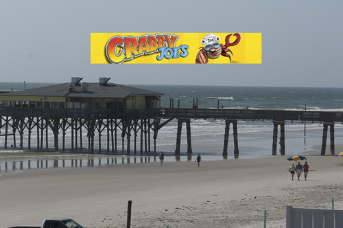 Crabby Joe's Restaurant and fishing pier is walking distance, visible from the Oceanfront rooms